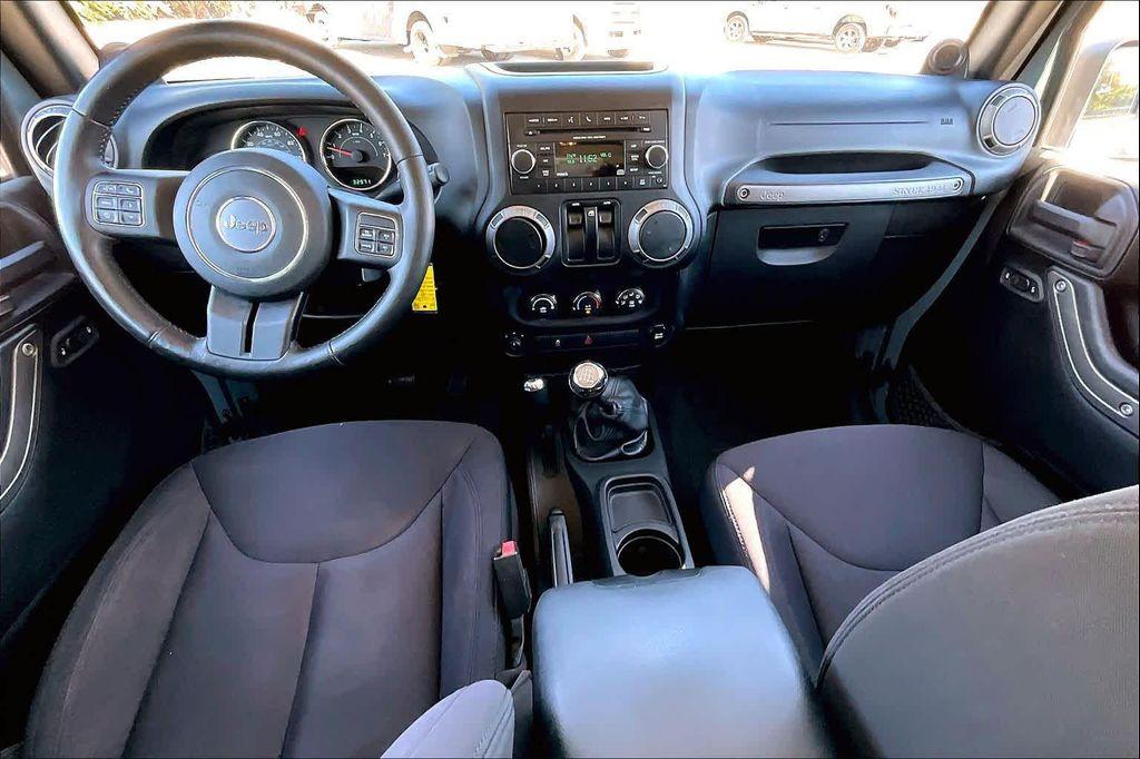 used 2014 Jeep Wrangler car, priced at $17,971