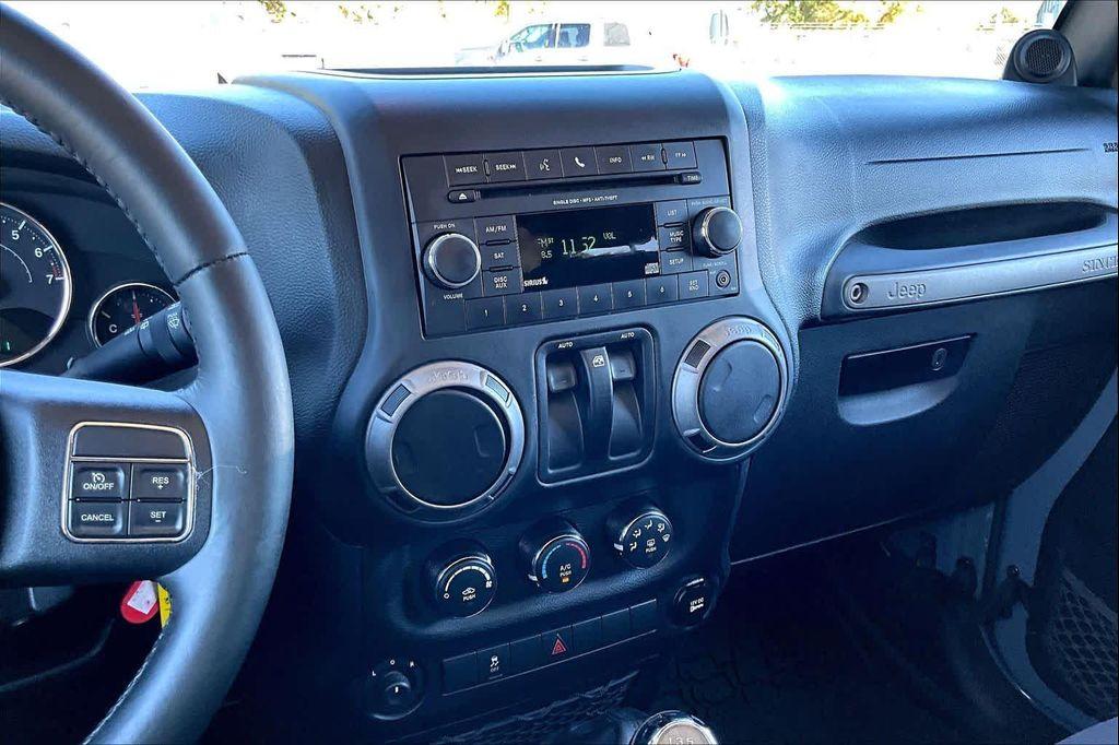 used 2014 Jeep Wrangler car, priced at $17,971