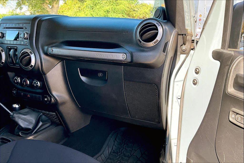 used 2014 Jeep Wrangler car, priced at $17,971