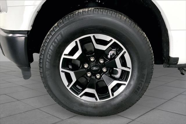 used 2022 Ford F-150 Lightning car, priced at $37,586