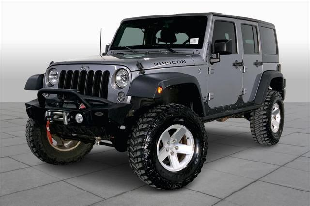 used 2016 Jeep Wrangler Unlimited car, priced at $24,971