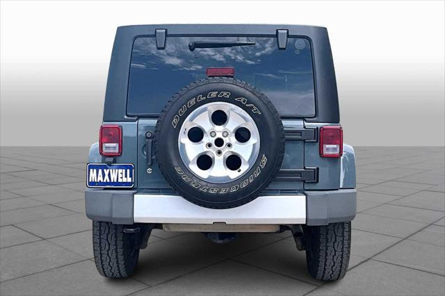 used 2014 Jeep Wrangler Unlimited car, priced at $18,468