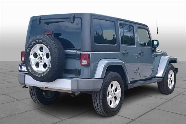 used 2014 Jeep Wrangler Unlimited car, priced at $18,468