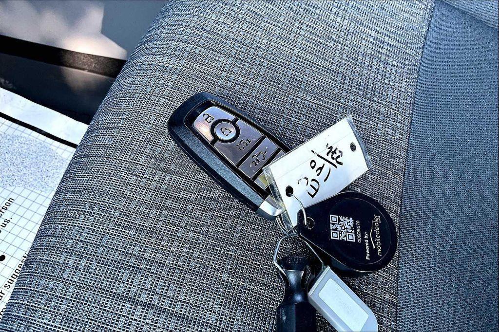 used 2023 Ford F-150 Lightning car, priced at $38,971