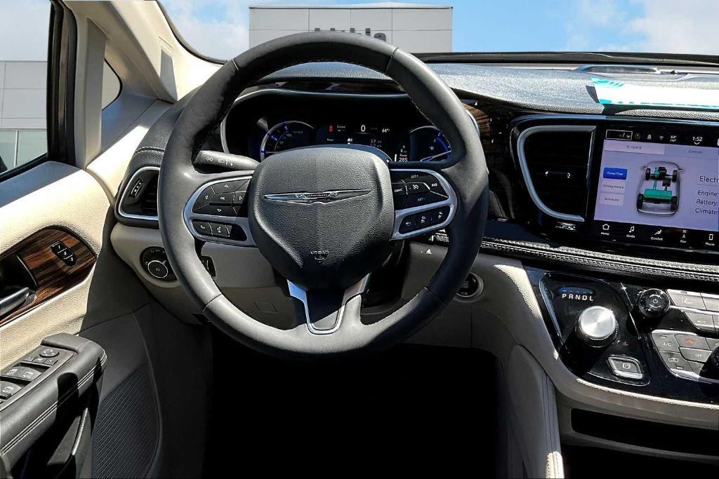 used 2023 Chrysler Pacifica Hybrid car, priced at $32,000