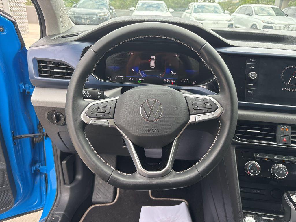 used 2023 Volkswagen Taos car, priced at $23,591