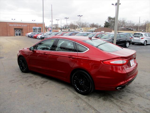 used 2014 Ford Fusion car, priced at $12,995