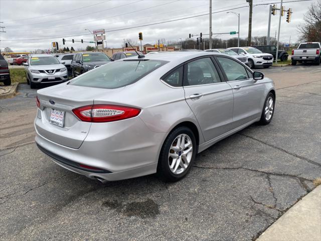 used 2015 Ford Fusion car, priced at $11,695