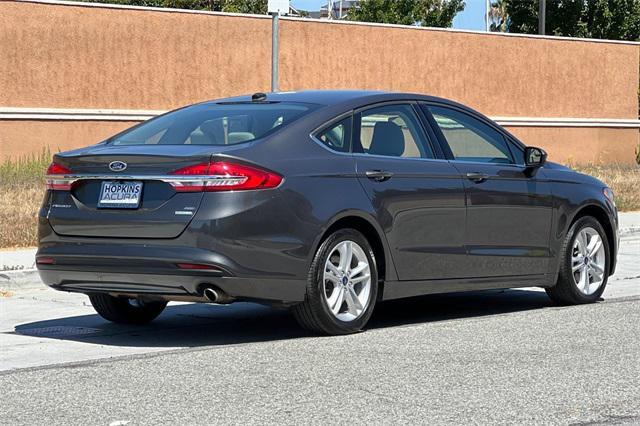 used 2018 Ford Fusion car, priced at $8,995