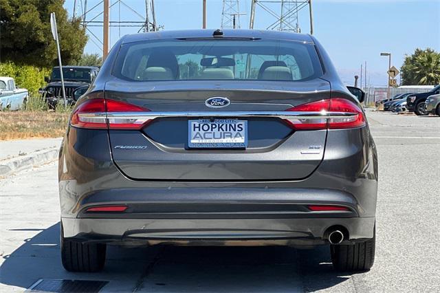 used 2018 Ford Fusion car, priced at $8,995