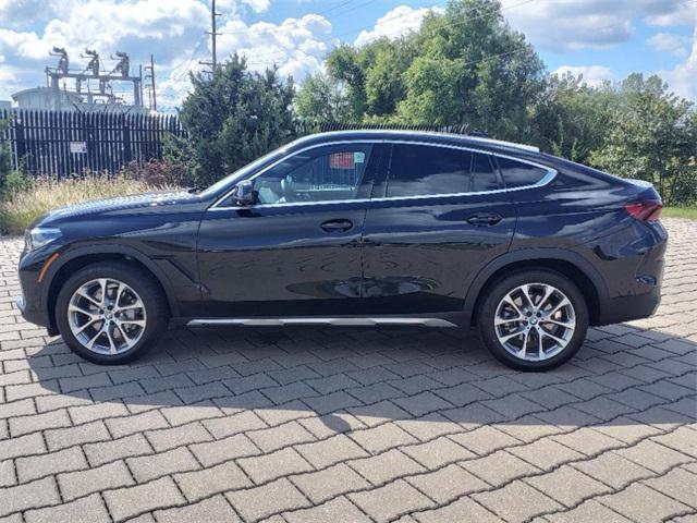 used 2023 BMW X6 car, priced at $59,379