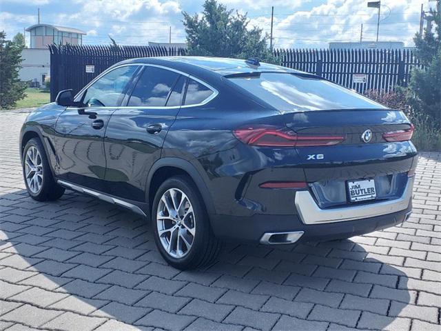 used 2023 BMW X6 car, priced at $59,379