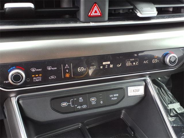 new 2025 Kia Carnival Hybrid car, priced at $53,735
