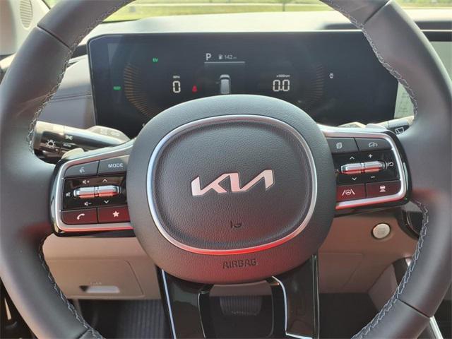 new 2025 Kia Carnival Hybrid car, priced at $43,670