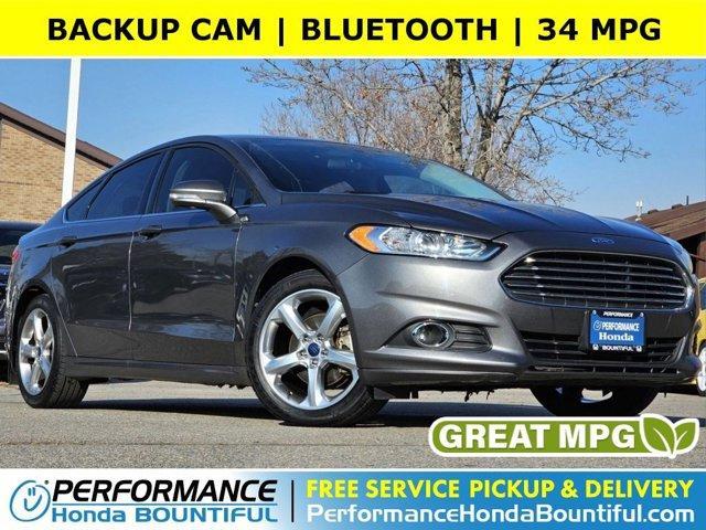 used 2014 Ford Fusion car, priced at $8,415