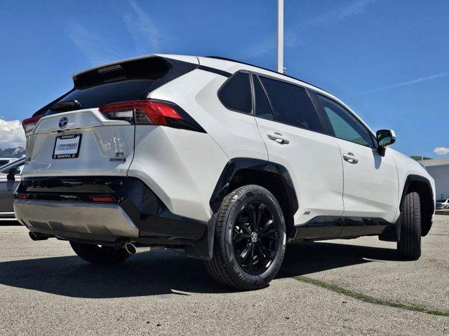 used 2023 Toyota RAV4 Hybrid car, priced at $34,590