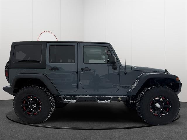 used 2015 Jeep Wrangler Unlimited car, priced at $19,788