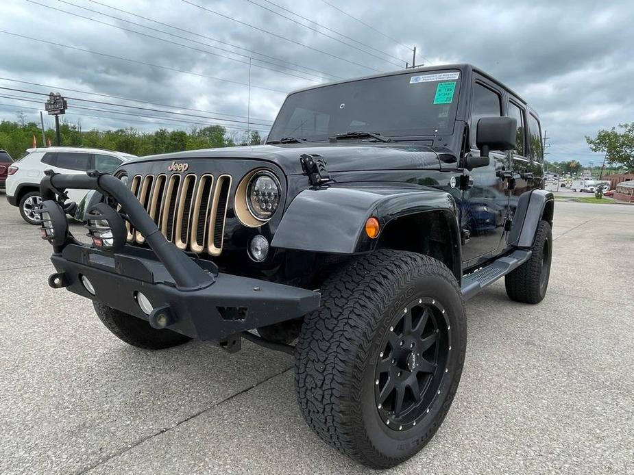 used 2014 Jeep Wrangler Unlimited car, priced at $22,488