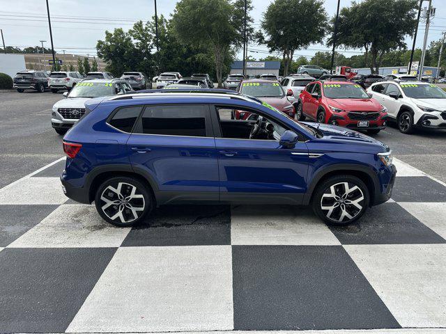 used 2023 Volkswagen Taos car, priced at $25,990