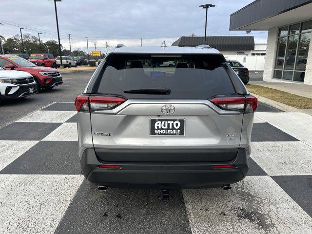 used 2023 Toyota RAV4 car, priced at $34,990