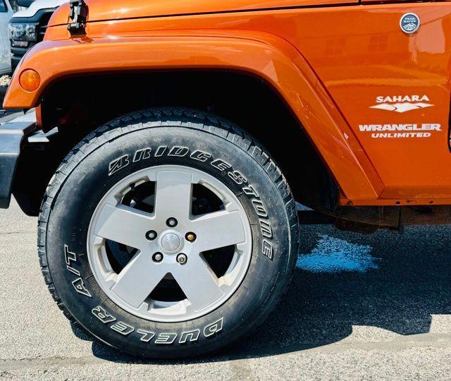 used 2011 Jeep Wrangler Unlimited car, priced at $15,500
