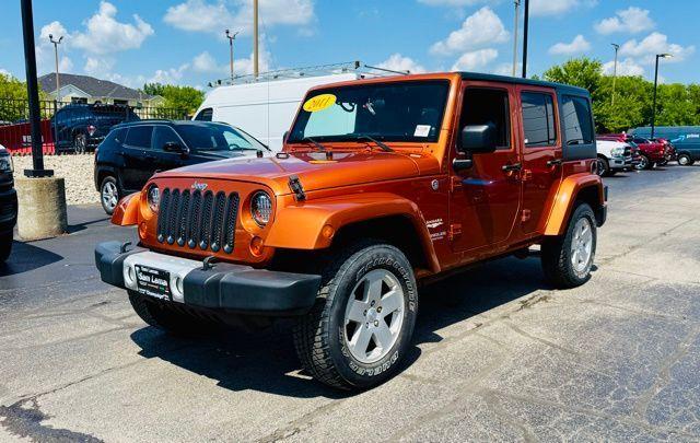 used 2011 Jeep Wrangler Unlimited car, priced at $15,500