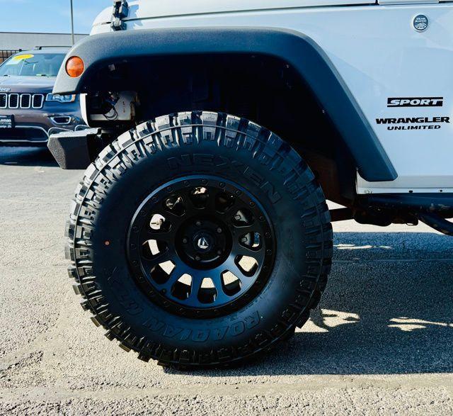 used 2014 Jeep Wrangler Unlimited car, priced at $15,495