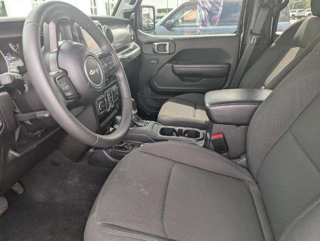 used 2023 Jeep Wrangler car, priced at $28,495