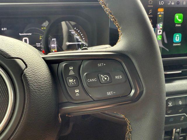 used 2024 Jeep Wrangler 4xe car, priced at $33,589