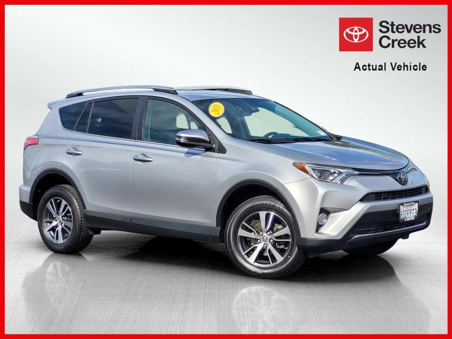 used 2018 Toyota RAV4 car, priced at $19,900