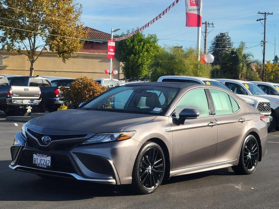 used 2021 Toyota Camry Hybrid car, priced at $24,900