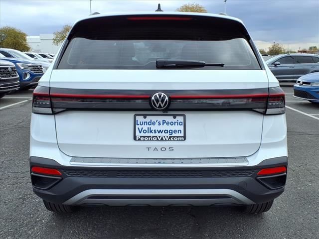 new 2025 Volkswagen Taos car, priced at $27,011