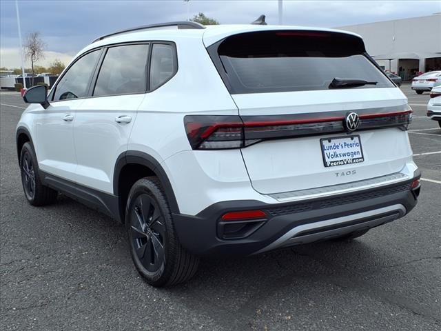 new 2025 Volkswagen Taos car, priced at $27,011