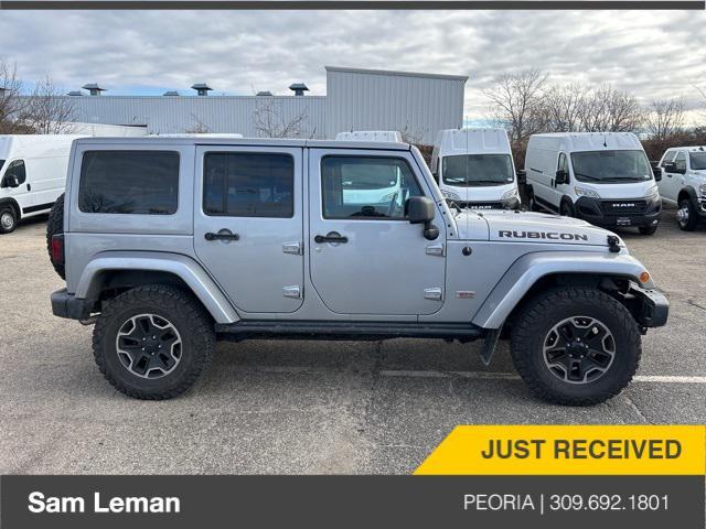 used 2013 Jeep Wrangler Unlimited car, priced at $17,250