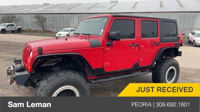 used 2012 Jeep Wrangler Unlimited car, priced at $15,850