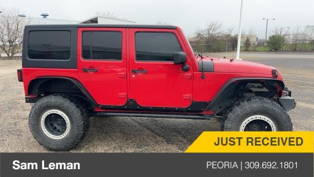 used 2012 Jeep Wrangler Unlimited car, priced at $15,700