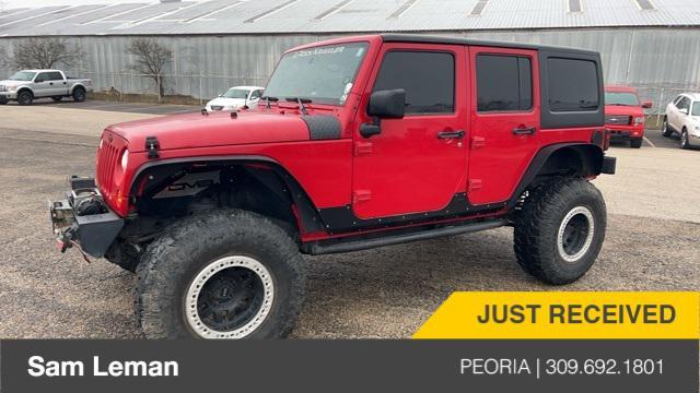used 2012 Jeep Wrangler Unlimited car, priced at $15,799