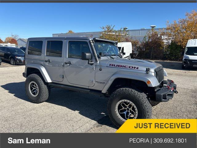 used 2014 Jeep Wrangler Unlimited car, priced at $24,775