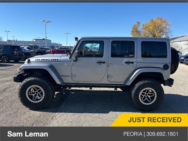 used 2014 Jeep Wrangler Unlimited car, priced at $24,775