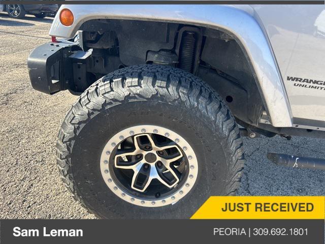 used 2014 Jeep Wrangler Unlimited car, priced at $24,775