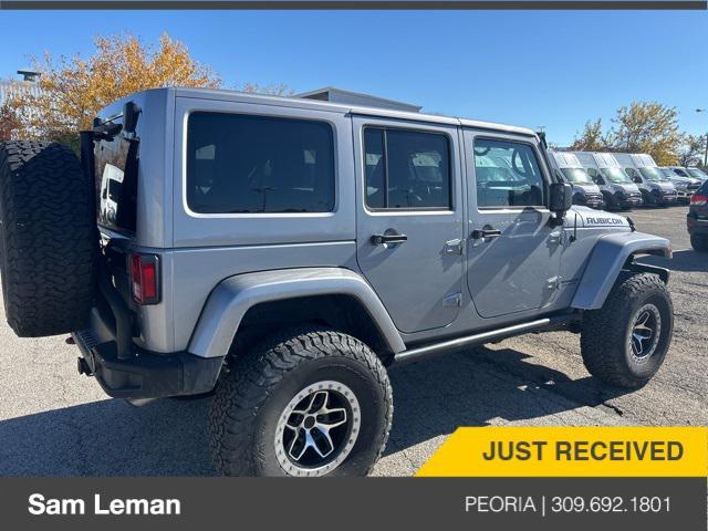 used 2014 Jeep Wrangler Unlimited car, priced at $24,775