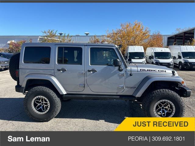 used 2014 Jeep Wrangler Unlimited car, priced at $24,775