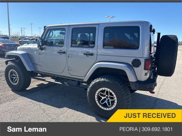 used 2014 Jeep Wrangler Unlimited car, priced at $24,775