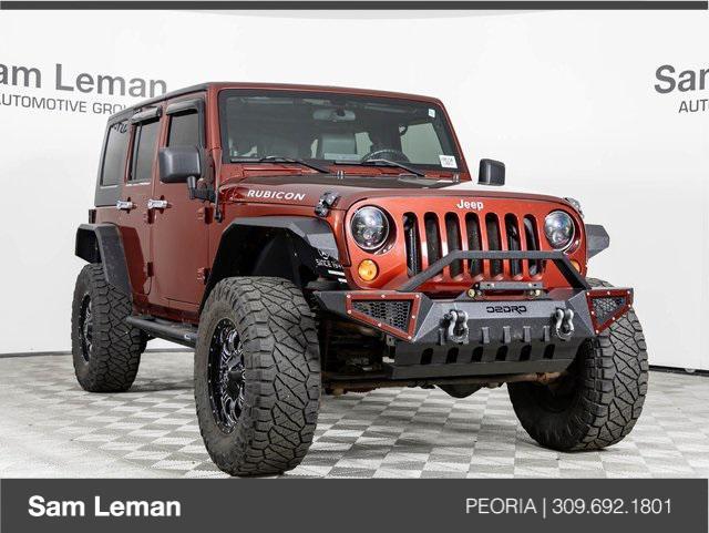 used 2009 Jeep Wrangler Unlimited car, priced at $17,400