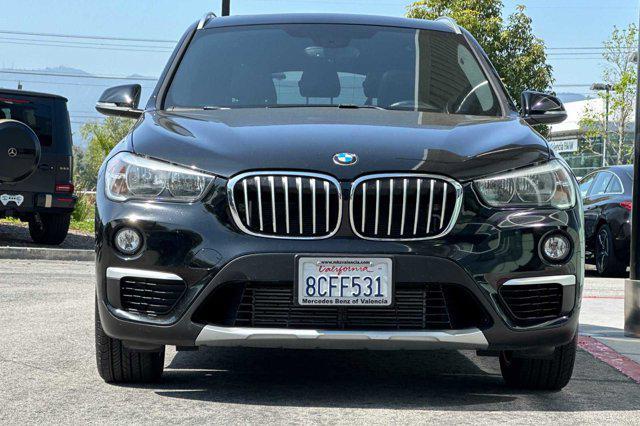 used 2018 BMW X1 car, priced at $21,749
