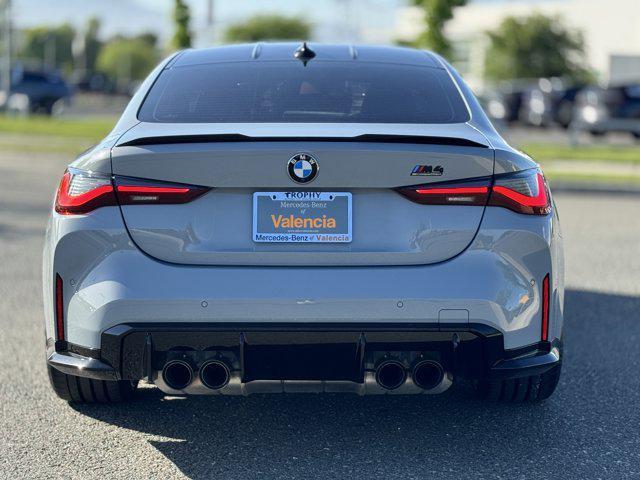 used 2022 BMW M4 car, priced at $74,100