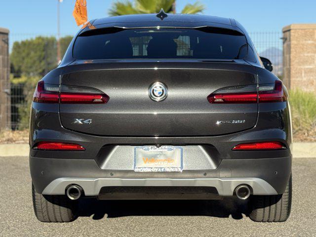 used 2021 BMW X4 car, priced at $30,900