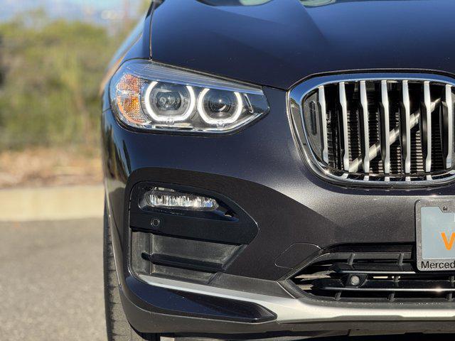 used 2021 BMW X4 car, priced at $30,900