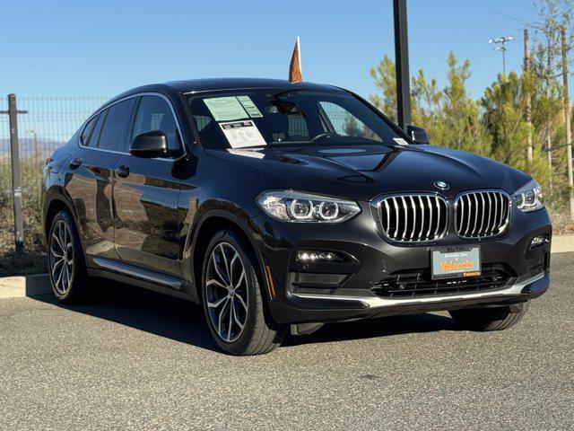 used 2021 BMW X4 car, priced at $30,900