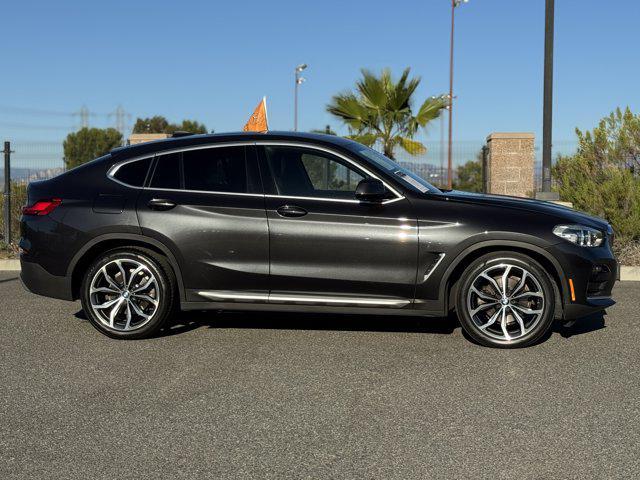 used 2021 BMW X4 car, priced at $30,900